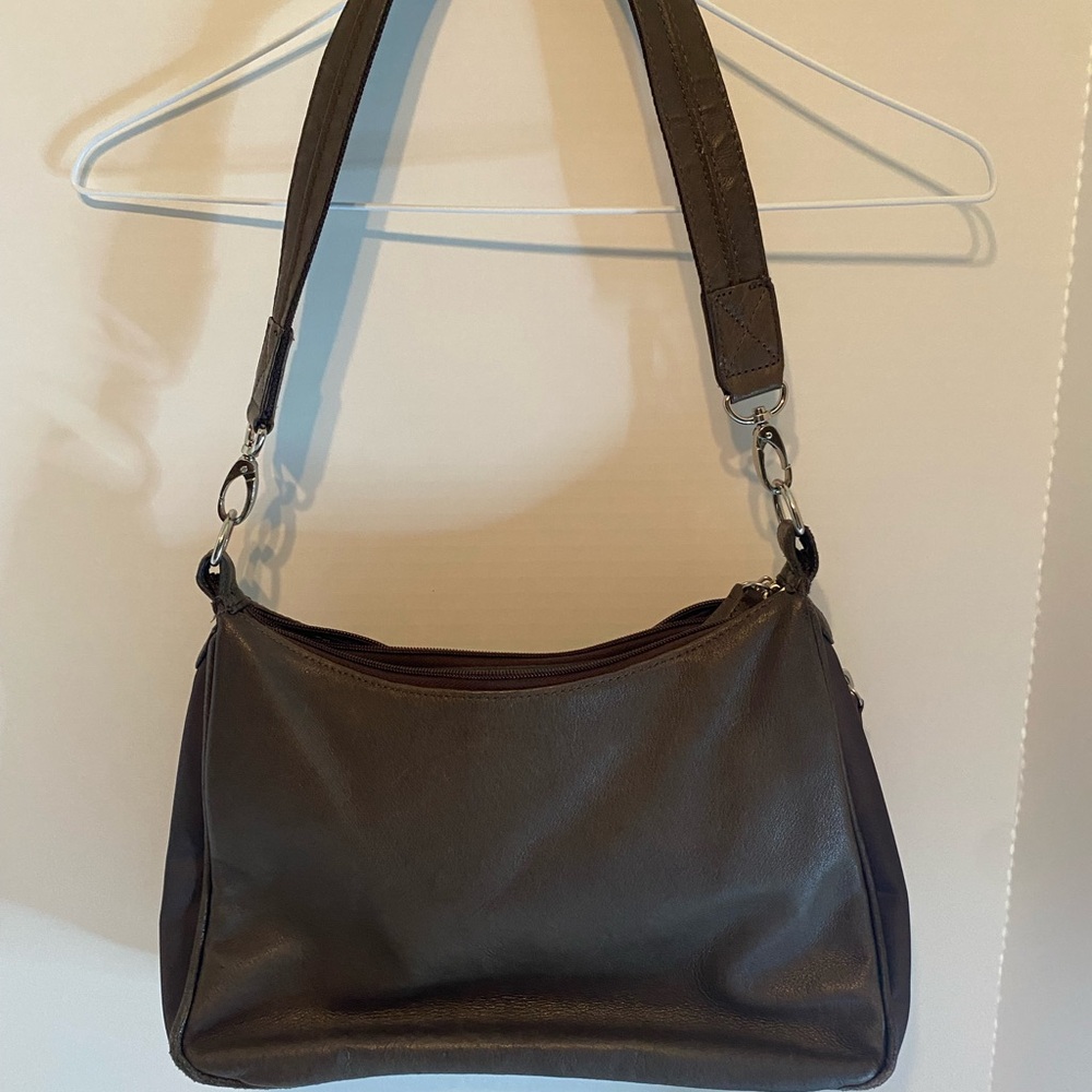 GUN TOTE’N MAMA PURSE LIKE NEW